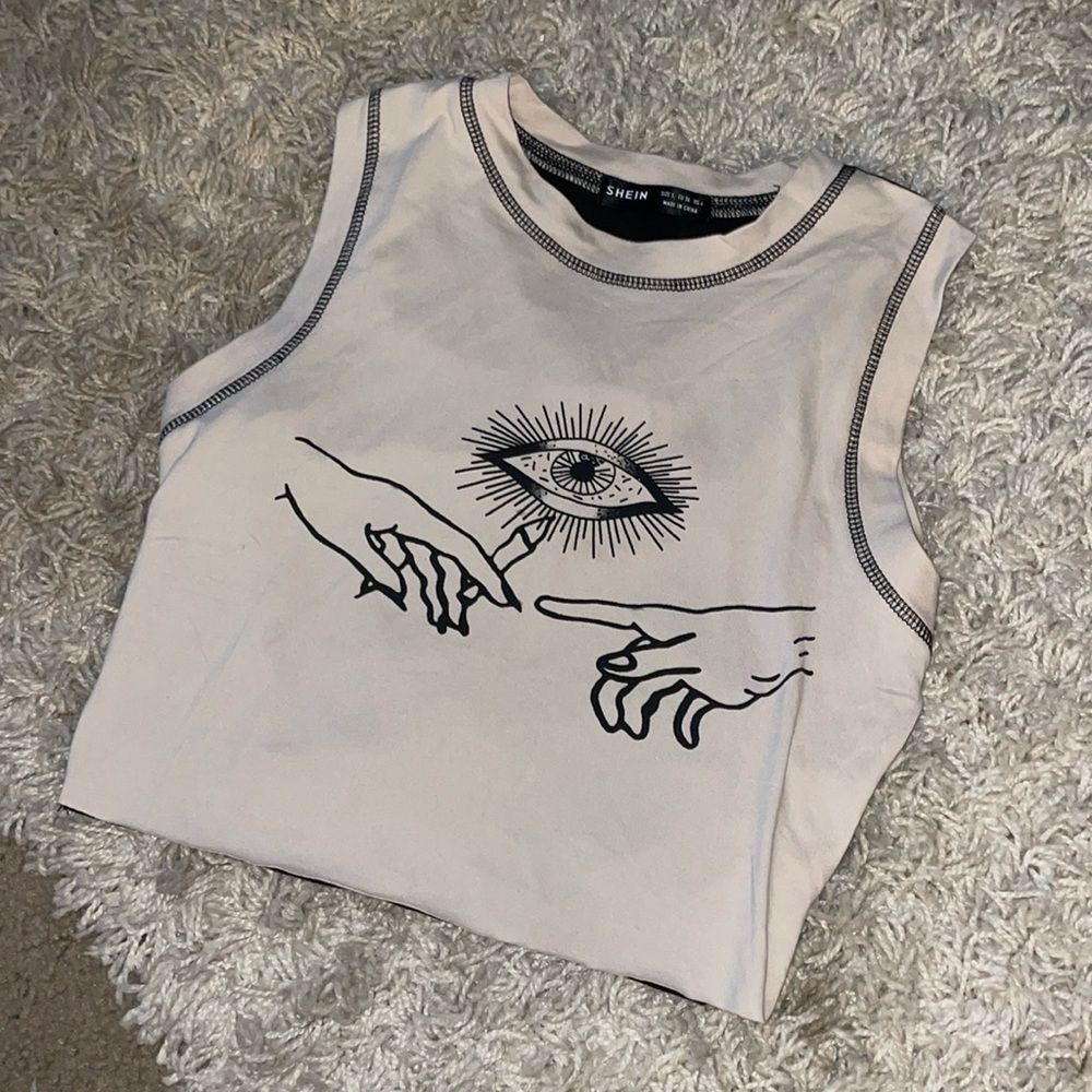 beige tank top with design